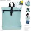 A collage of images showcasing a mint green backpack, including close-ups, lifestyle shots, and detail views. Produktbild-Vorschau