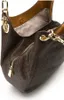A close-up view of a brown Michael Kors handbag with a monogram pattern and gold hardware. Produktbild-Vorschau