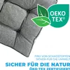 A close-up of a gray cushion with an OEKO-TEX certification logo and text about being free of harmful substances and safe for nature. Produktbild-Vorschau