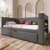 A modern daybed with integrated charging ports and storage, set in a well-lit room with arched wall decor. Podgląd zdjęcia produktu