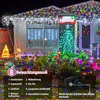 A house decorated with numerous colorful Christmas lights, showcasing different lighting modes. Produktbild-Vorschau