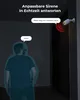 A security camera is shown mounted on a wall, with a person detected in the foreground. Text overlays indicate features like customizable siren and real-time responses. Podgląd zdjęcia produktu