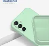 A close-up view of a mint green phone case, showing the camera cutout and the interior lining. Produktbild-Vorschau