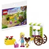 A LEGO Friends flower cart playset with two minifigures and accessories, shown both in its packaging and assembled. Náhled obrázku produktu