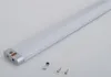 A silver LED light bar with a white diffuser, shown on a light gray background. Two small screws and two small caps are placed in front of the light bar. Náhľad obrázku produktu