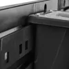 Close-up of a black plastic storage bin and its mounting system. Náhľad obrázku produktu