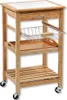 A kitchen cart made of bamboo with a tiled top, a drawer, a wire basket, and a wooden tray. Produktbild-Vorschau
