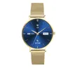A close-up studio shot of a smartwatch with a blue face and gold band. Produktbild-Vorschau