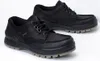 A pair of black leather shoes on a white background. Produktbild-Vorschau