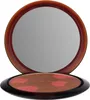 An open compact bronzer with a mirror. Voir les images du produit