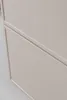 A close-up view of a beige cabinet with a horizontal dividing line. Produktbild-Vorschau