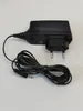 A black Nokia power adapter with a coiled cord and European plug. Produktbild-Vorschau