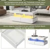 A modern white coffee table with LED lighting and drawers, shown in a living room setting and with close-up details. Náhled obrázku produktu