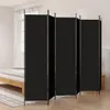 A black room divider is set up in a bedroom next to a bed. Anteprima dell’immagine prodotto