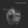 A black infrared motion sensor with dimensions indicated. Produktbild-Vorschau