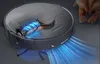 A robot vacuum cleaner is shown in action, with a visual representation of its suction power and a cat in the background. Náhľad obrázku produktu