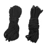 Two bundles of black rope are shown against a white background. Voir les images du produit