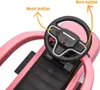 Close-up view of the steering wheel and seat of a pink ride-on toy car. Anteprima dell’immagine prodotto