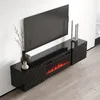 A black media console with an electric fireplace is shown against a white wall and light wooden floor. Produktbild-Vorschau