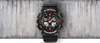 A black G-Shock watch with red accents is displayed against a textured concrete wall. Náhľad obrázku produktu