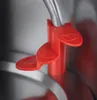 Close-up of red indicators on a silver appliance. Náhľad obrázku produktu