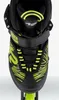 Close-up view of the front of a black and lime green roller skate. Náhľad obrázku produktu
