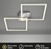 A modern LED ceiling light with a glitter effect, mounted on a gray ceiling. Produktbild-Vorschau