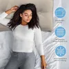 A woman sleeping on a bed with a pillow. Produktbild-Vorschau