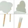 A collage of four close-up shots of a children's table and chair set with a cloud design. Anteprima dell’immagine prodotto