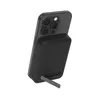A black Belkin BoostCharge Pro power bank is attached to the back of a black smartphone. The power bank has a kickstand extended. Voir les images du produit