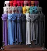 A rack of colorful scarves displayed in rows. Produktbild-Vorschau