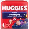 Packaging for Huggies Overnights Pants, size 4, showing a sleeping baby and cartoon characters. Produktbild-Vorschau