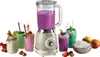 A retro-style blender is shown in the center, surrounded by several colorful smoothies in glasses, a jar with a drink, a bowl of crushed ice, and some fruits. Produktbild-Vorschau