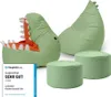 A set of children's beanbag chairs shaped like dinosaurs, with two poufs, on a white background. Anteprima dell’immagine prodotto