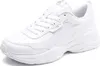 A white Puma sneaker is shown from a side-angle on a white background. Podgląd zdjęcia produktu