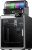 A 3D printer with a filament dryer on top, both are gray and black. The filament dryer has spools of colorful filament inside. Podgląd zdjęcia produktu