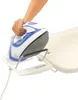A hand is holding an iron over an ironing board. Voir les images du produit