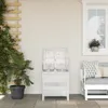A white wooden garden chest is open on a patio next to a potted plant and a bench with cushions. Produktbild-Vorschau
