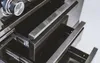 A close-up view of the drawers and control panel of an outdoor kitchen appliance. Produktbild-Vorschau