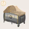 A baby crib/playpen with a mosquito net canopy. Podgląd zdjęcia produktu