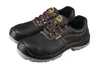 A pair of black safety shoes with orange stitching and laces, presented on a white background. Produktbild-Vorschau