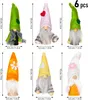 A collage of six decorative gnome ornaments, each with a different colored hat and some with small embellishments like hearts or flowers. They are arranged in two rows of three. Produktbild-Vorschau