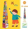 A child is playing with stacking cubes, with a kite flying in the background. Anteprima dell’immagine prodotto