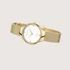 A studio shot of a gold Bering watch with a white face. Produktbild-Vorschau