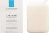 A product shot of a bar of soap and its packaging. Podgląd zdjęcia produktu