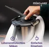 A hand is shown inserting a gray silicone attachment into a silver and white kitchen appliance. Podgląd zdjęcia produktu
