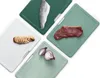 Four cutting boards with different food items on them. Anteprima dell’immagine prodotto