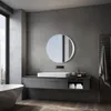 A modern bathroom with a vanity, sink, mirror, and bathtub. Podgląd zdjęcia produktu