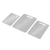Three silver cutting boards of different sizes are arranged diagonally on a white background. Produktbild-Vorschau