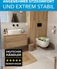 A modern bathroom with a sink, toilet, and wooden cabinet. Produktbild-Vorschau